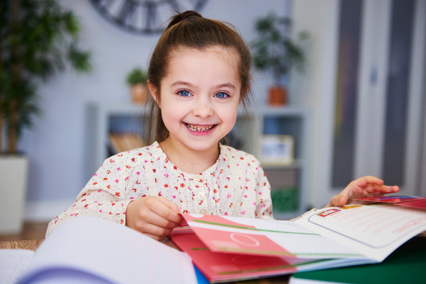 smiling child studying at home