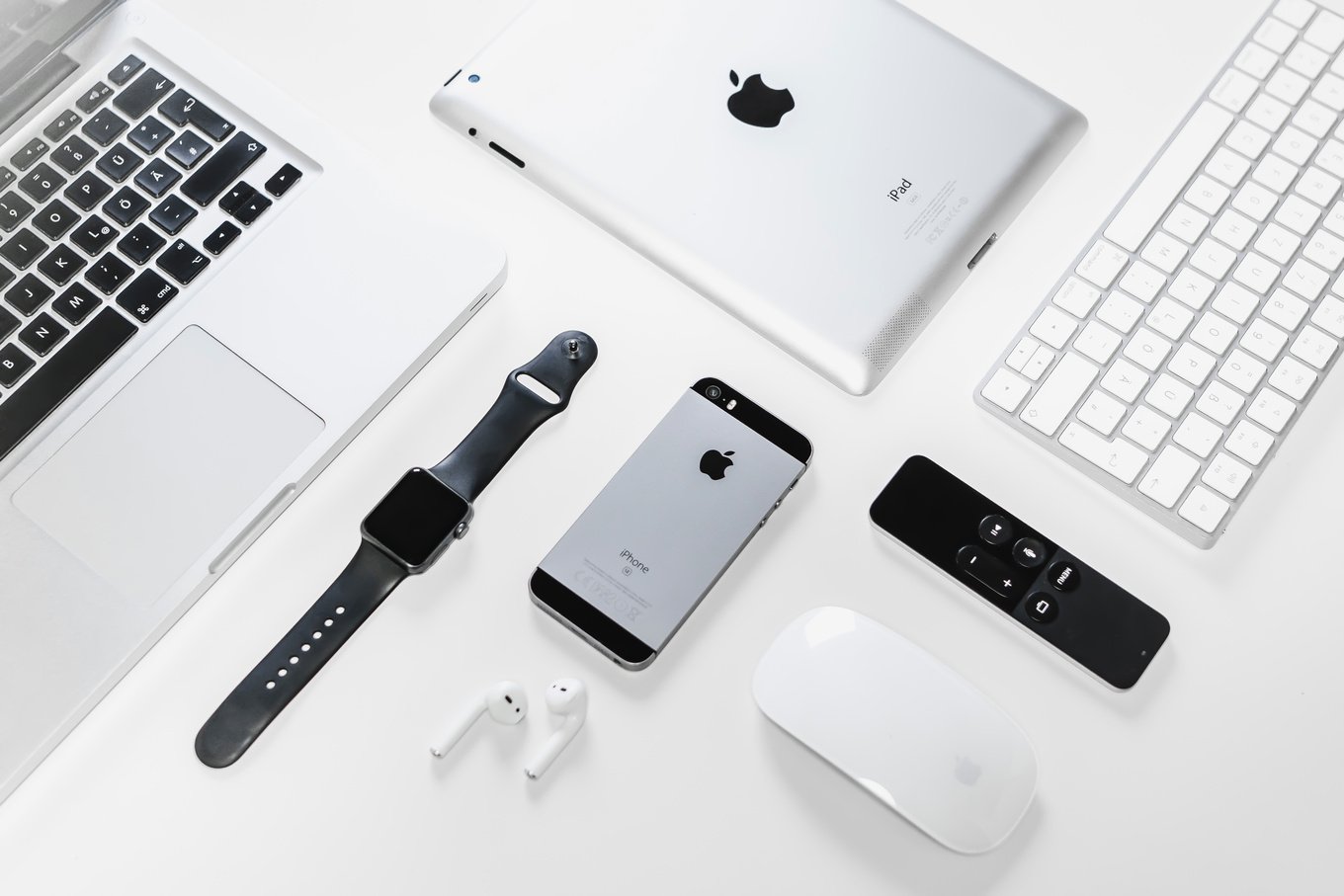 Apple Gadgets on White Surface 